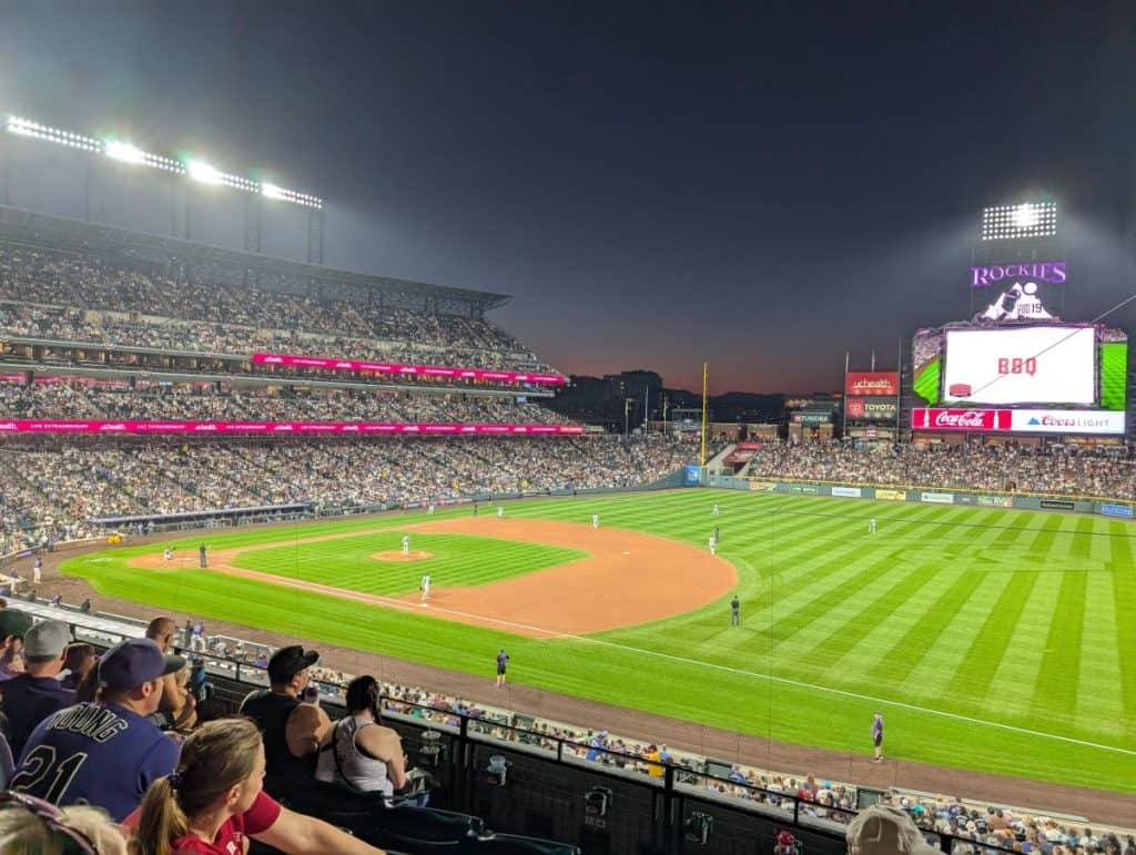 Rockies playing a game at Coors Field at night