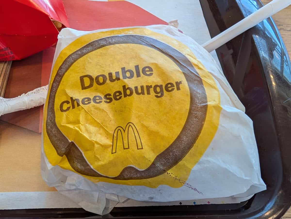 Closeup of a McDonald's double cheeseburger on a tray